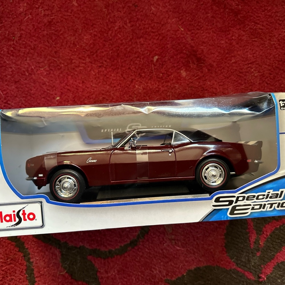 Red Die-Cast Model Car with Chrome Accents by